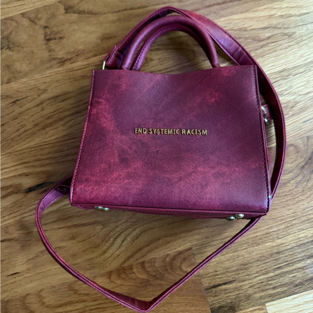 Brandon Blackwood

“End Systemic Racism” Mini tote - Picture 5 of 5